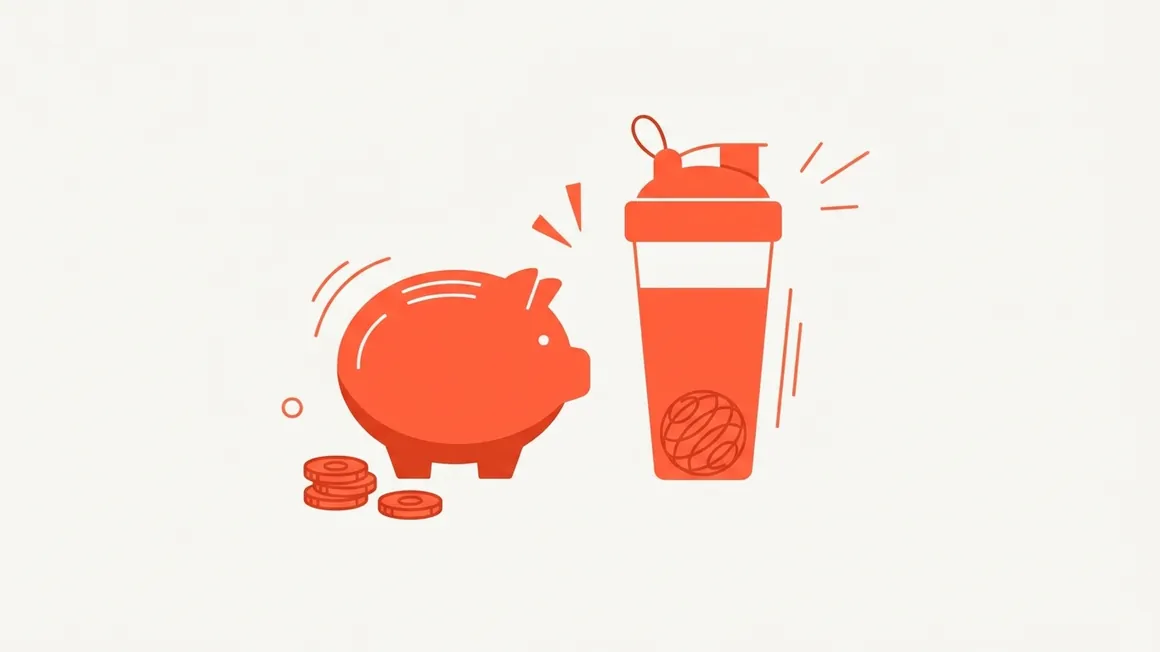 A piggy bank next to a protein shaker.